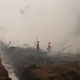 Image for article titled Photos: Inside the toxic haze, a “crime against humanity” caused by Indonesia’s fires